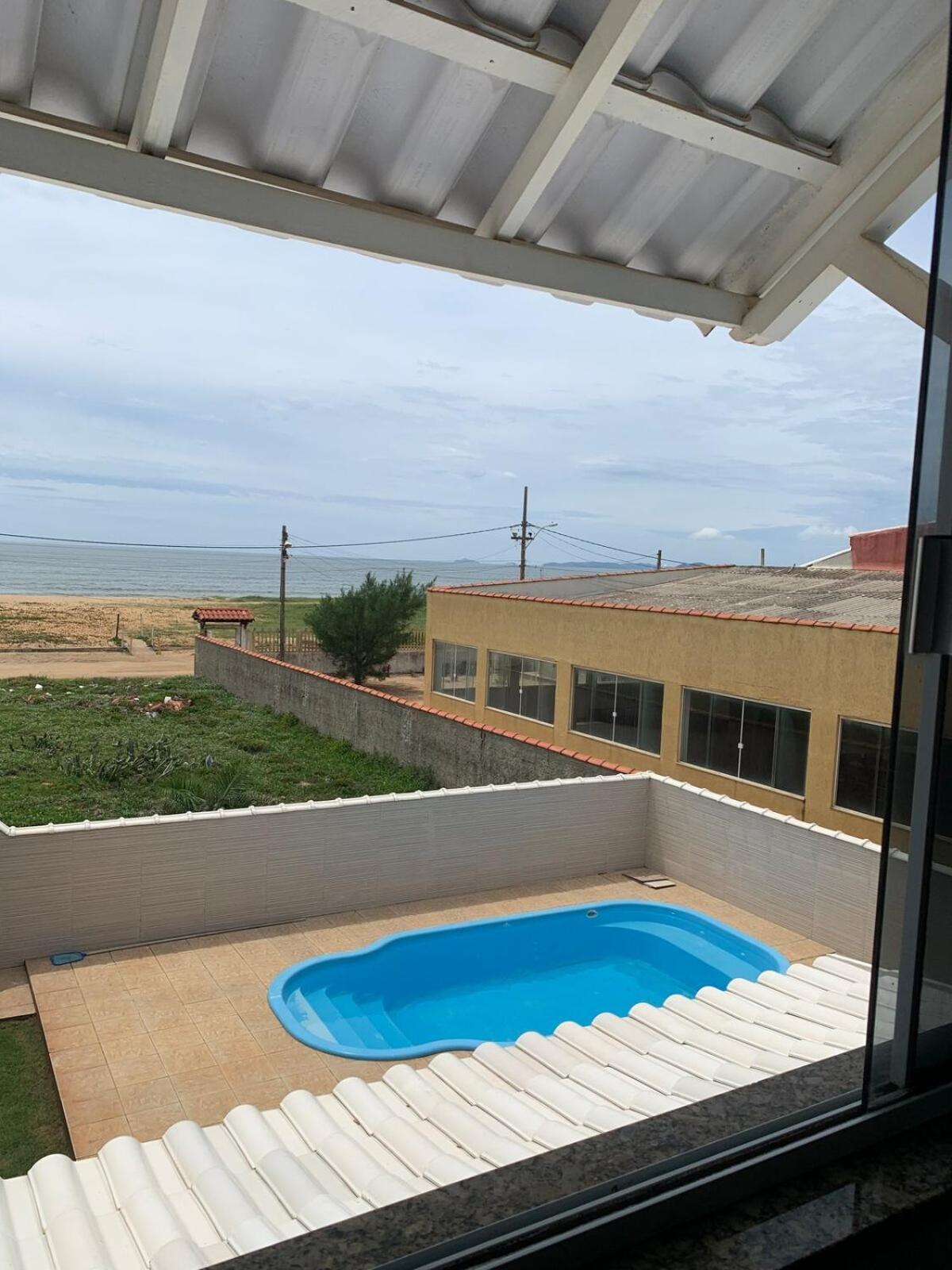 Casa Com Piscina Em Condominio E Pe Na Areia Unamar Cabo Frio Exterior photo